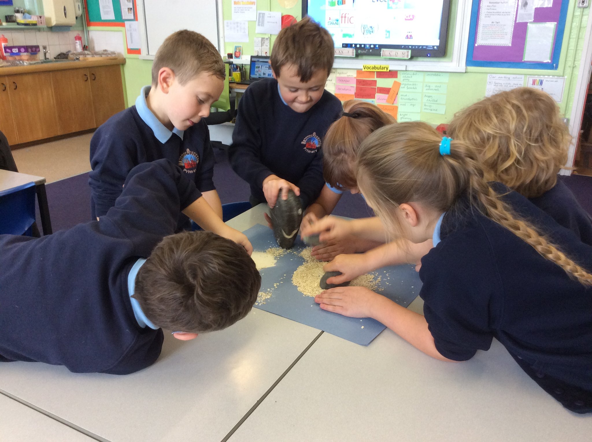 Image of Making flour, stone age style